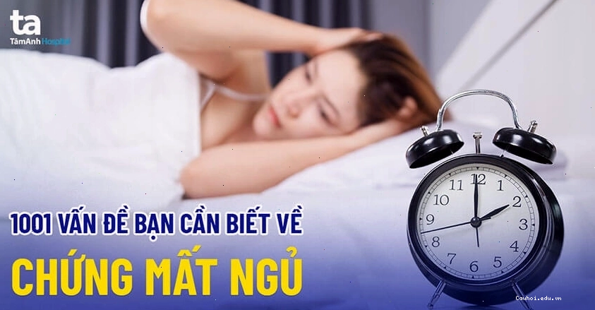Người đang trằn trọc trên giường vì mất ngủ