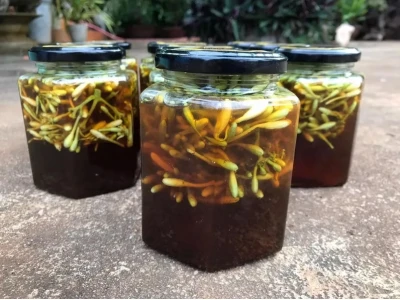 Tác hại tiềm ẩn của hoa đu đủ đực ngâm mật ong bạn cần biết
